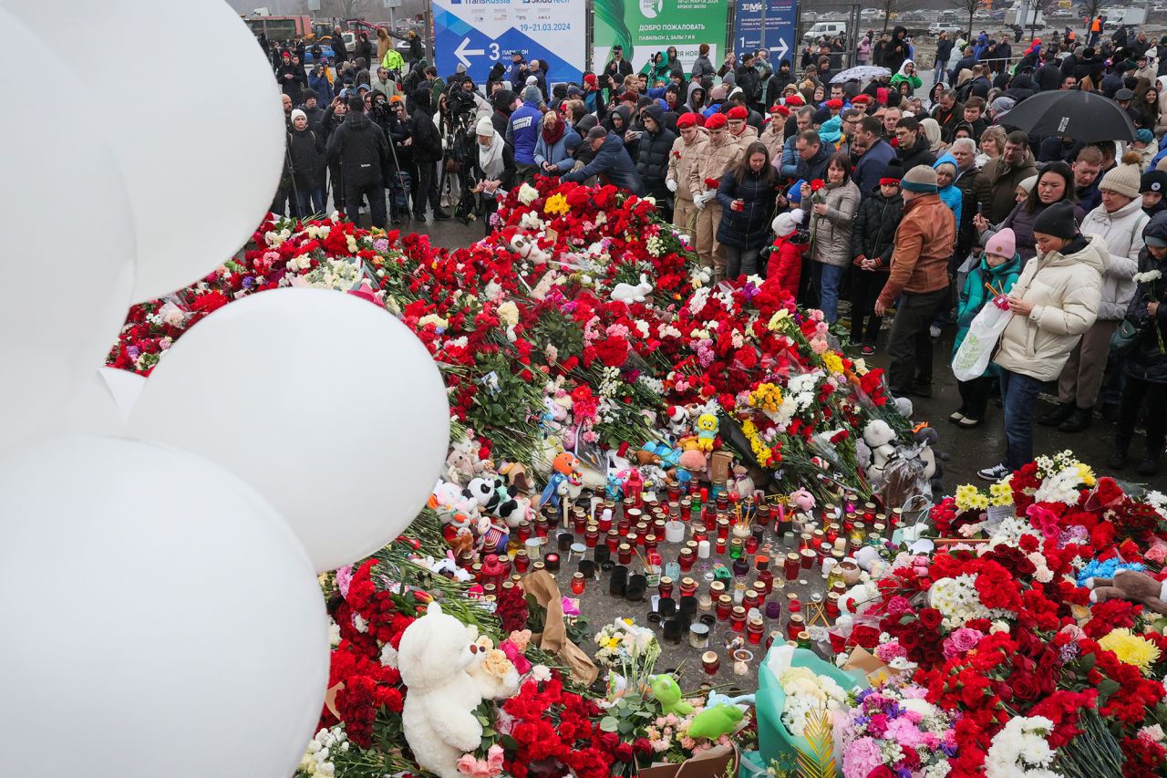 People gather at a memorial outside the Crocus City Hall in Moscow, Russia, on March 24.