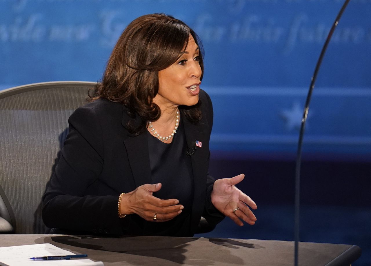 Democratic vice presidential candidate Sen. Kamala Harris speaks to Vice President Mike Pence during the vice presidential debate on Wednesday in Salt Lake City. 