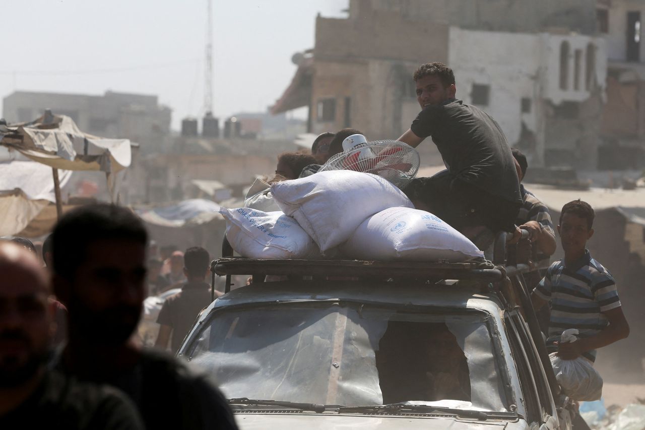 People flee the eastern part of Khan Younis in Gaza on Monday.