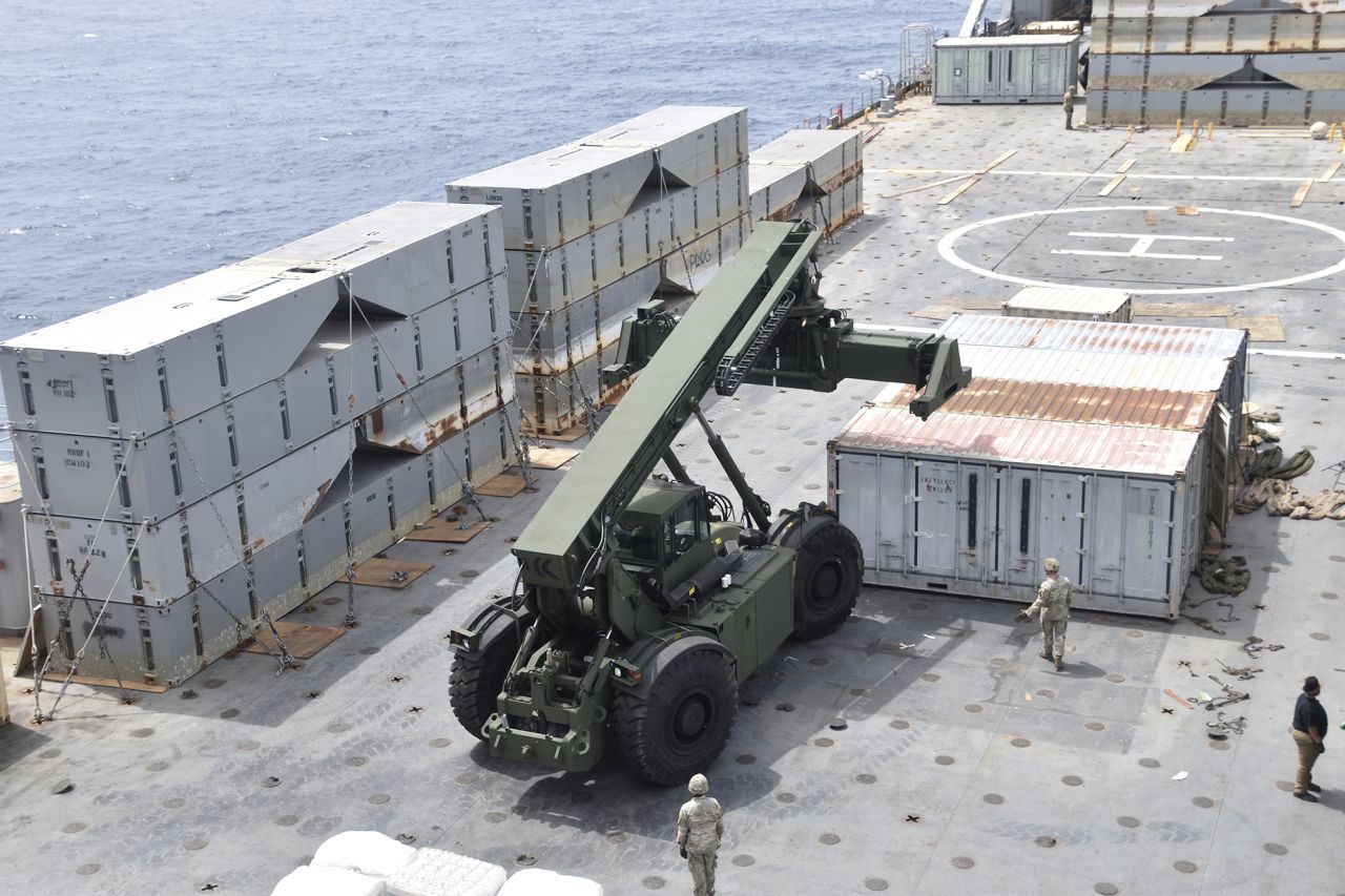 In this image provided by the U.S. Army soldiers assigned to the 7th Transportation Brigade (Expeditionary) and sailors attached to the MV Roy P. Benavidez assemble the Roll-On, Roll-Off Distribution Facility (RRDF), or floating pier, off the shore of Gaza on April 26.