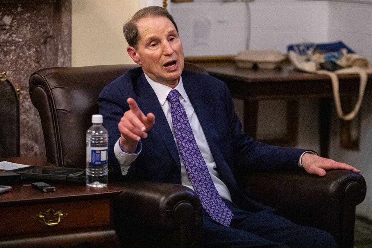 Wyden speaks to members of the press in the Senate Press Gallery in August.