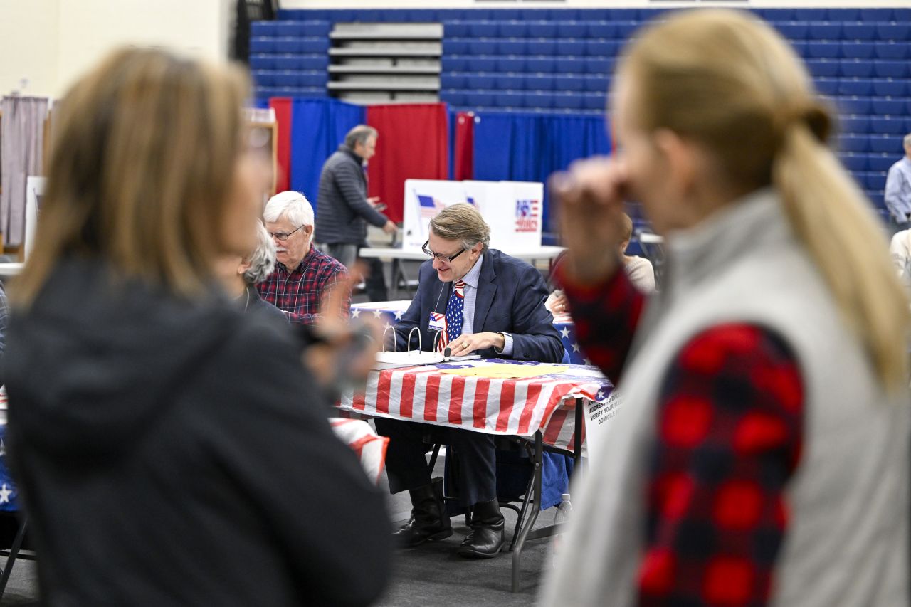 Poll workers check in voters in Windham, New Hampshire.