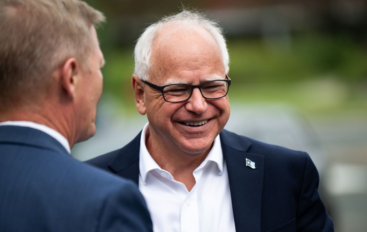 Minnesota Gov. Tim Walz arrives to speak at a press conference in Bloomington, Minnesota, on August 1.