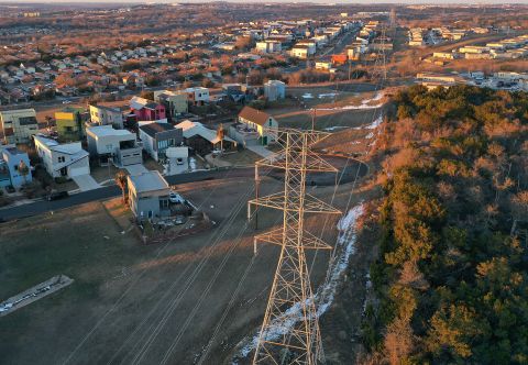 An aerial view from a drone shows electrical lines running through a neighborhood on February 19, in Austin, Texas. 