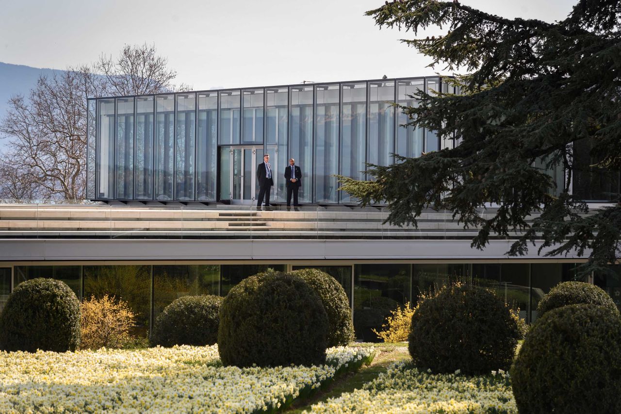 Security guards stands outside the UEFA headquarters in Nyon, Switzerland, during an emergency meeting on March 17.