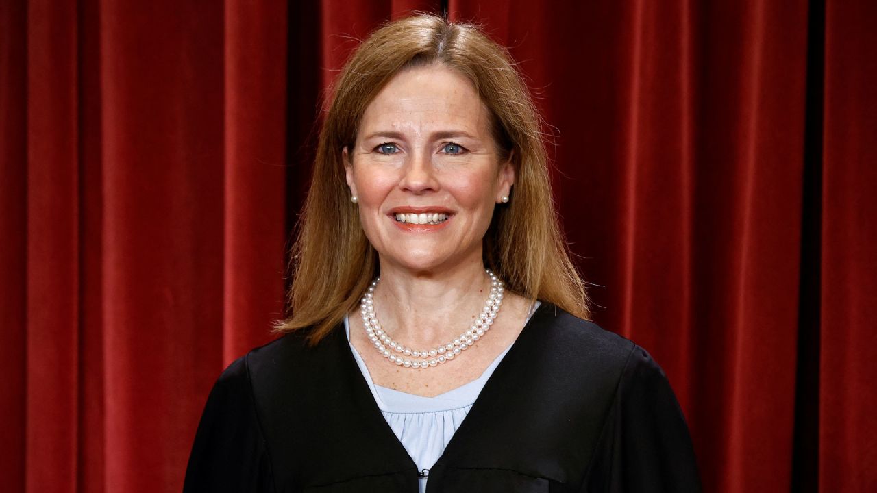 Supreme Court Justice Amy Coney Barrett attends a group photo session with the rest of the court in October.