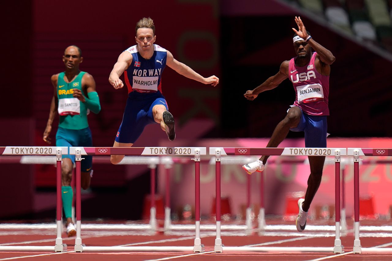 Norway's Karsten Warholm leads in the 400 meters hurdles final on Tuesday.