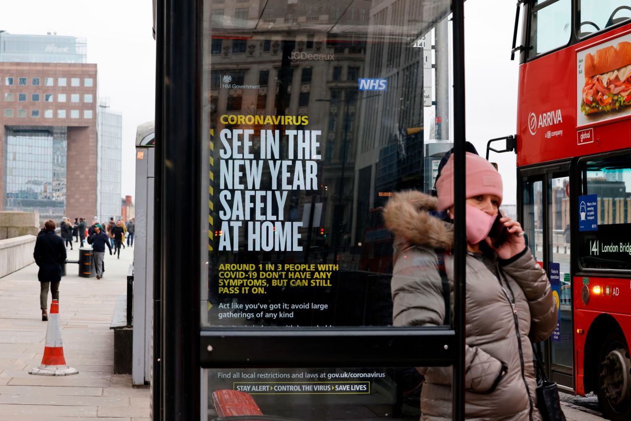 A government message about the coronavirus tier 4 restrictions is seen urging people to stay home in London on December 29.