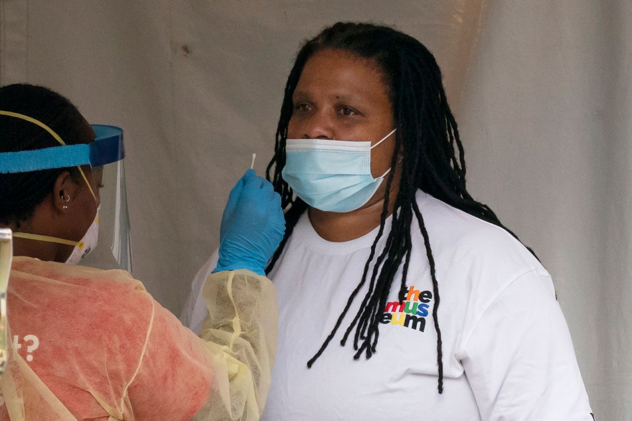 A nurse administers a Covid-19 test on F Street in Washington, DC, on August 14. 