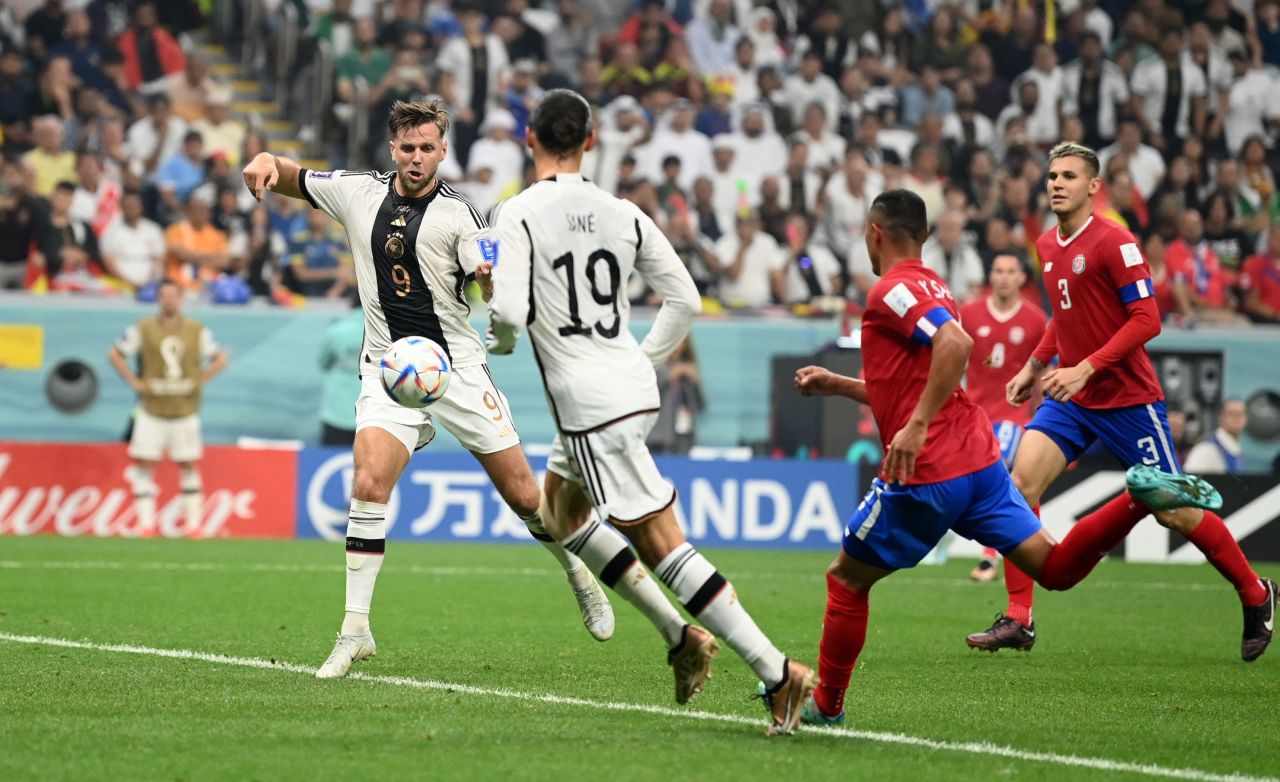 Germany's Niclas Fullkrug scores his team's fourth goal.