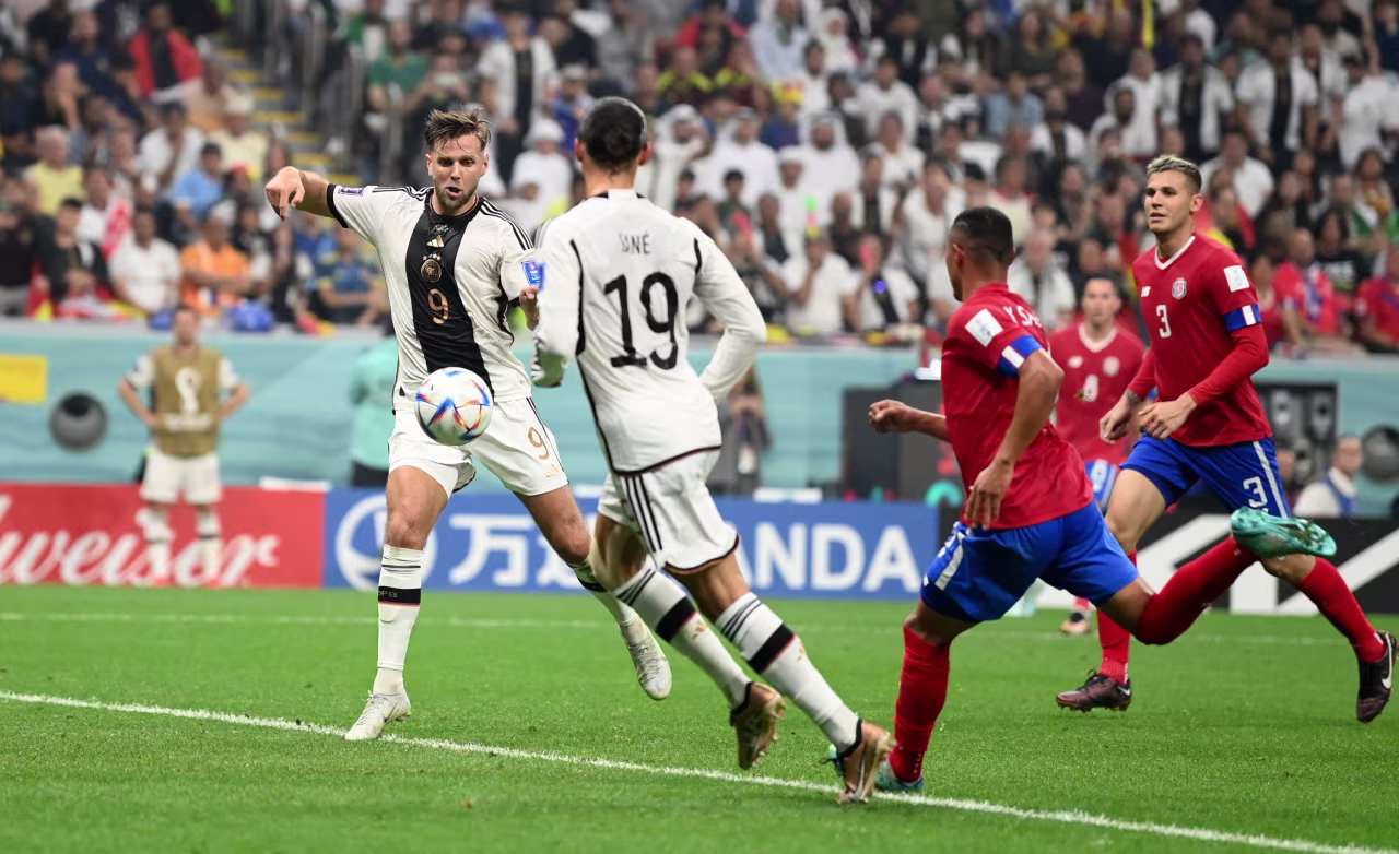 Germany's Niclas Fullkrug scores his team's fourth goal.