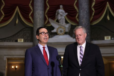 Treasury Secretary Steven Mnuchin, left, and White House chief of staff Mark Meadows speak to the press on August 7 at the Capitol in Washington, DC.
