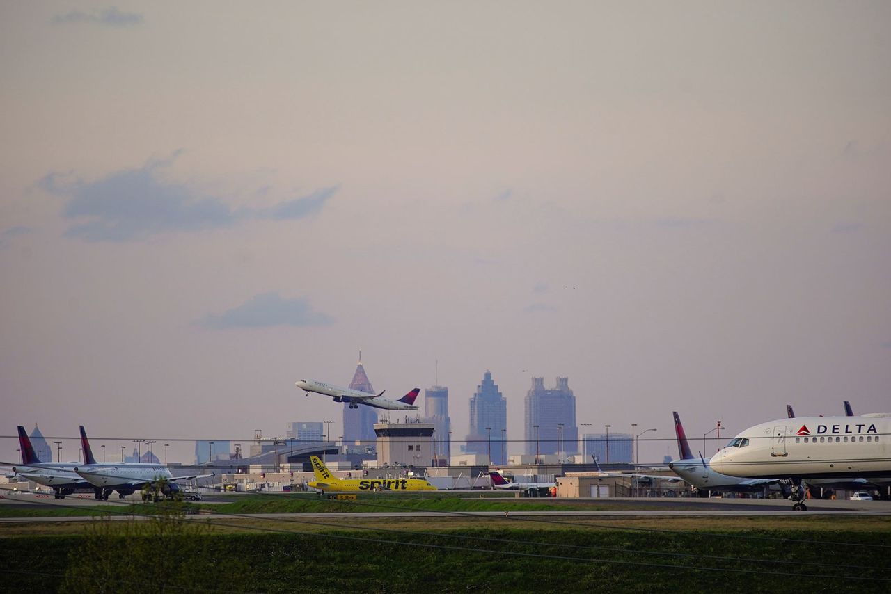 Planes take off from Atlanta Hartsfield-Jackson International Airport.