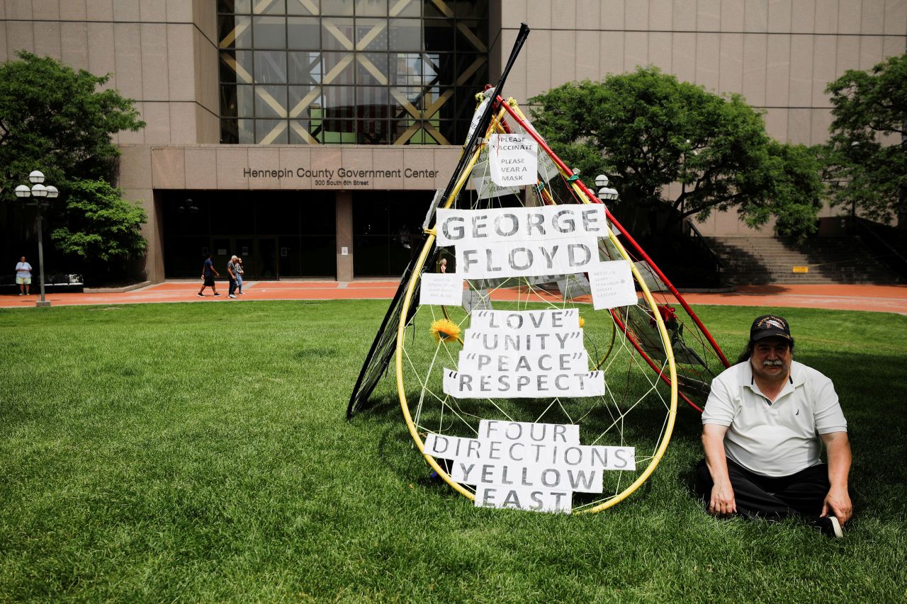 A person waits outside Hennepin County Government Center ahead of Chauvin's sentencing.