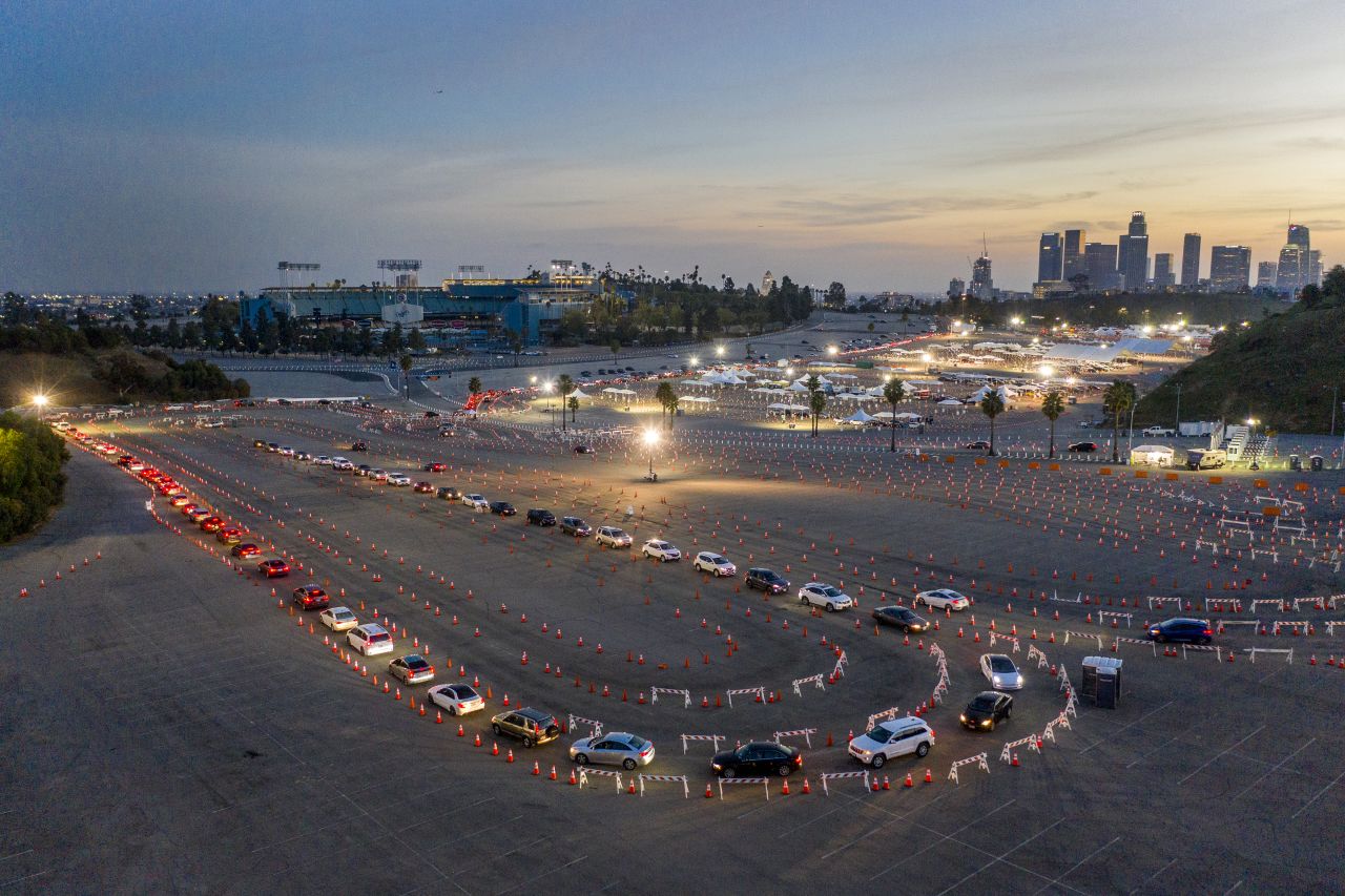 Hundreds line up to get Covid-19 vaccine shots at Dodger Stadium on Monday, February 8, in Los Angeles.