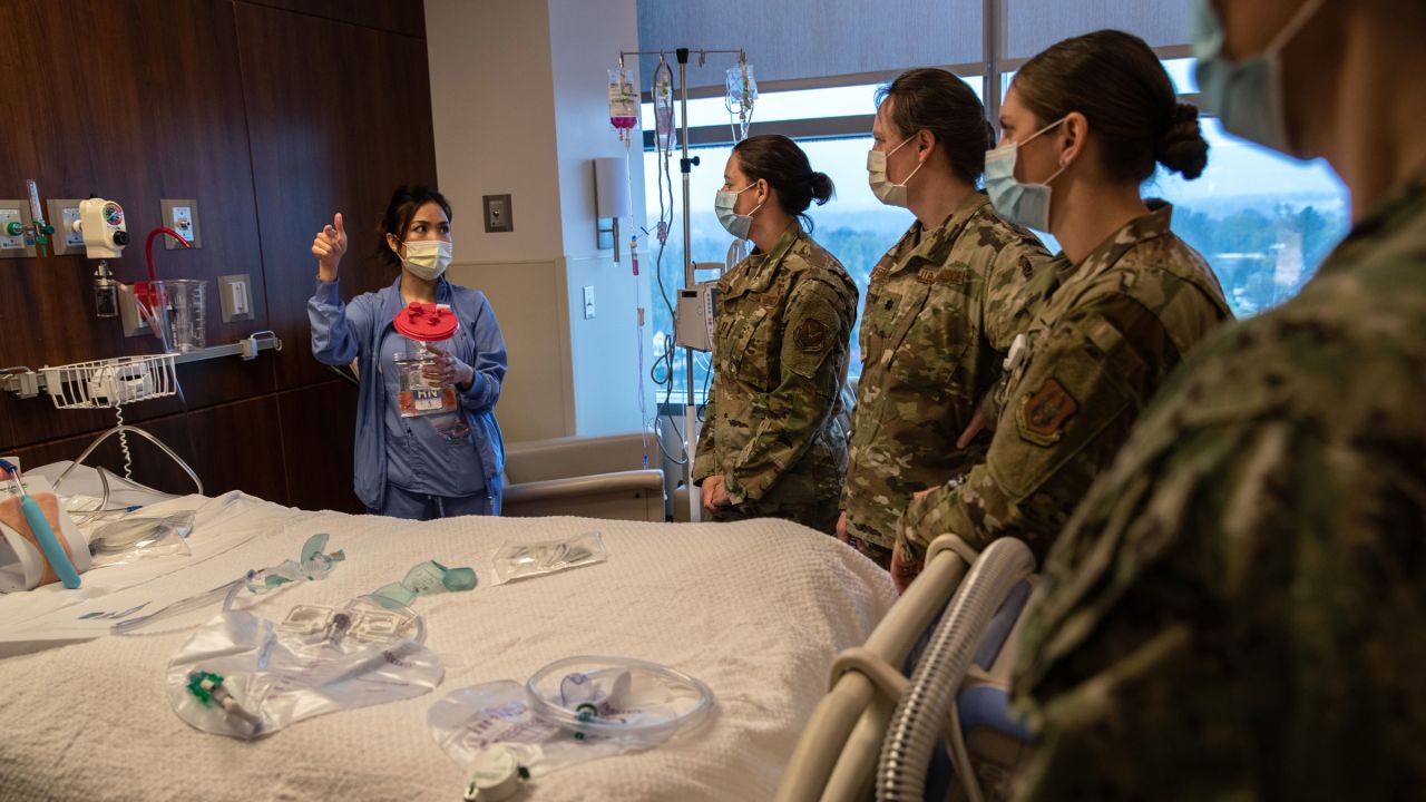 Military medical personnel, including members of the US Army Reserve and the Connecticut National Guard, train with hospital staff in Stamford, Connecticut, in April.