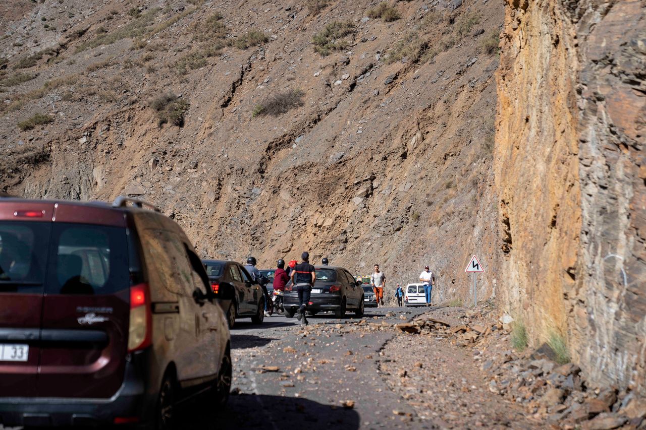 Motorists drive along a road on the way to earthquake-affected villages in the Atlas Mountains, near Marrakech, Morocco, on September 9.
