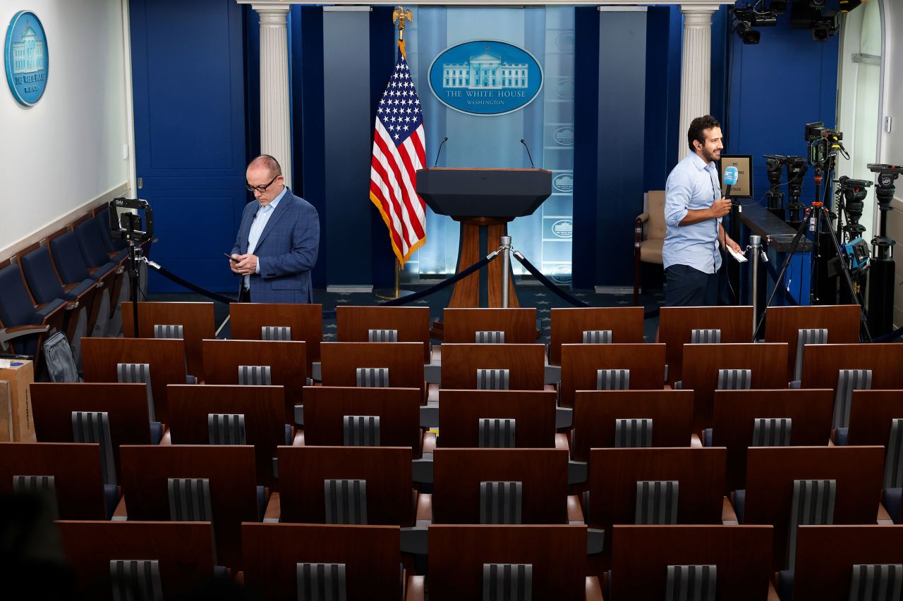 Correspondents use the White House Briefing Room to file reports of US President Joe Biden's decision not to seek re-election on July 21 in Washington, DC.