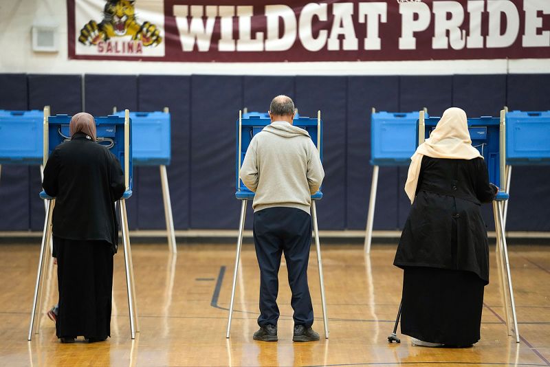 Voters fill out their ballots for the Michigan primary election in Dearborn, Michigan, on Tuesday, February 27.