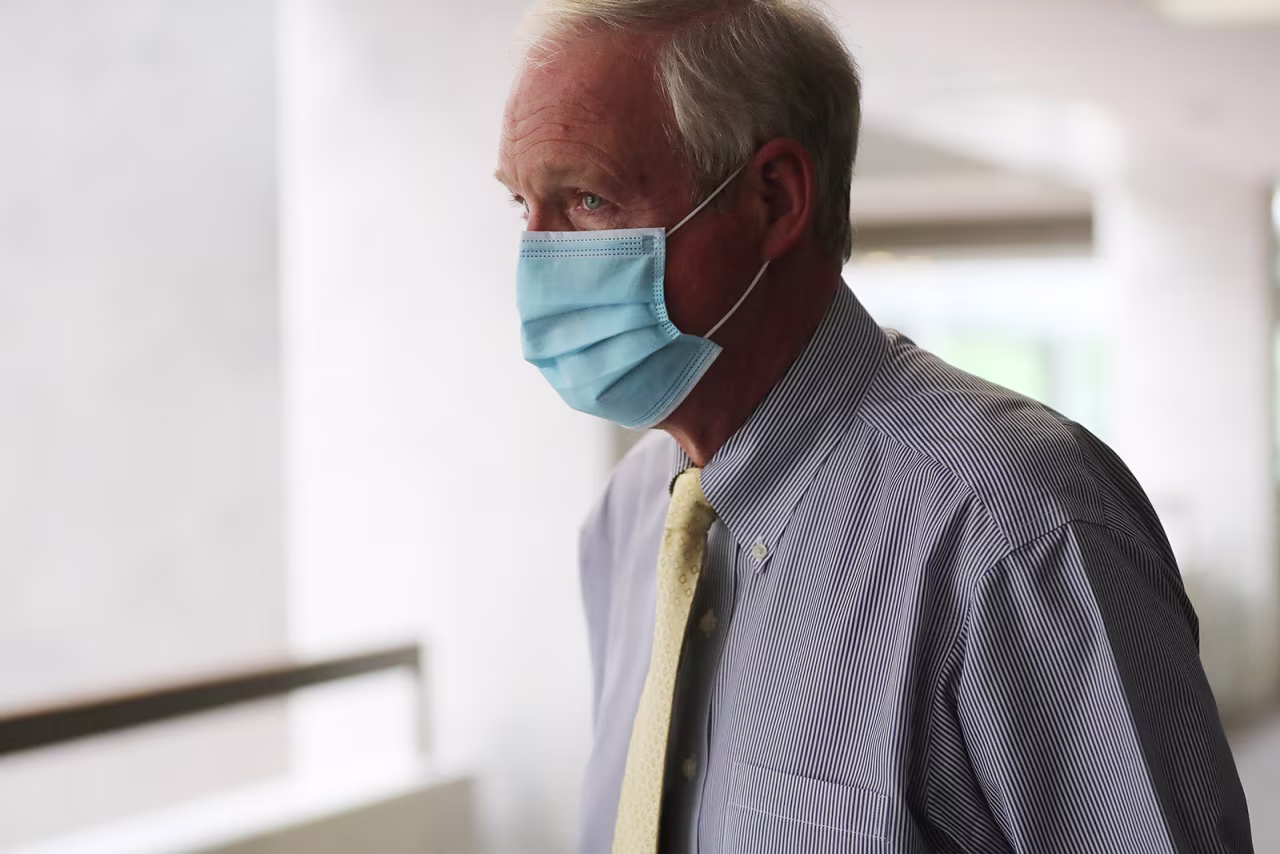 Sen. Ron Johnson departs a Republican senate luncheon in the Hart Senate Office Building on Capitol Hill September 16, in Washington, DC.