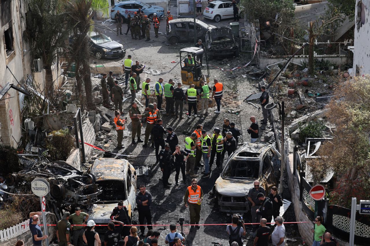 First responders work at the site of a rocket attack in Kiryat Bialik, Israel, on September 22. 