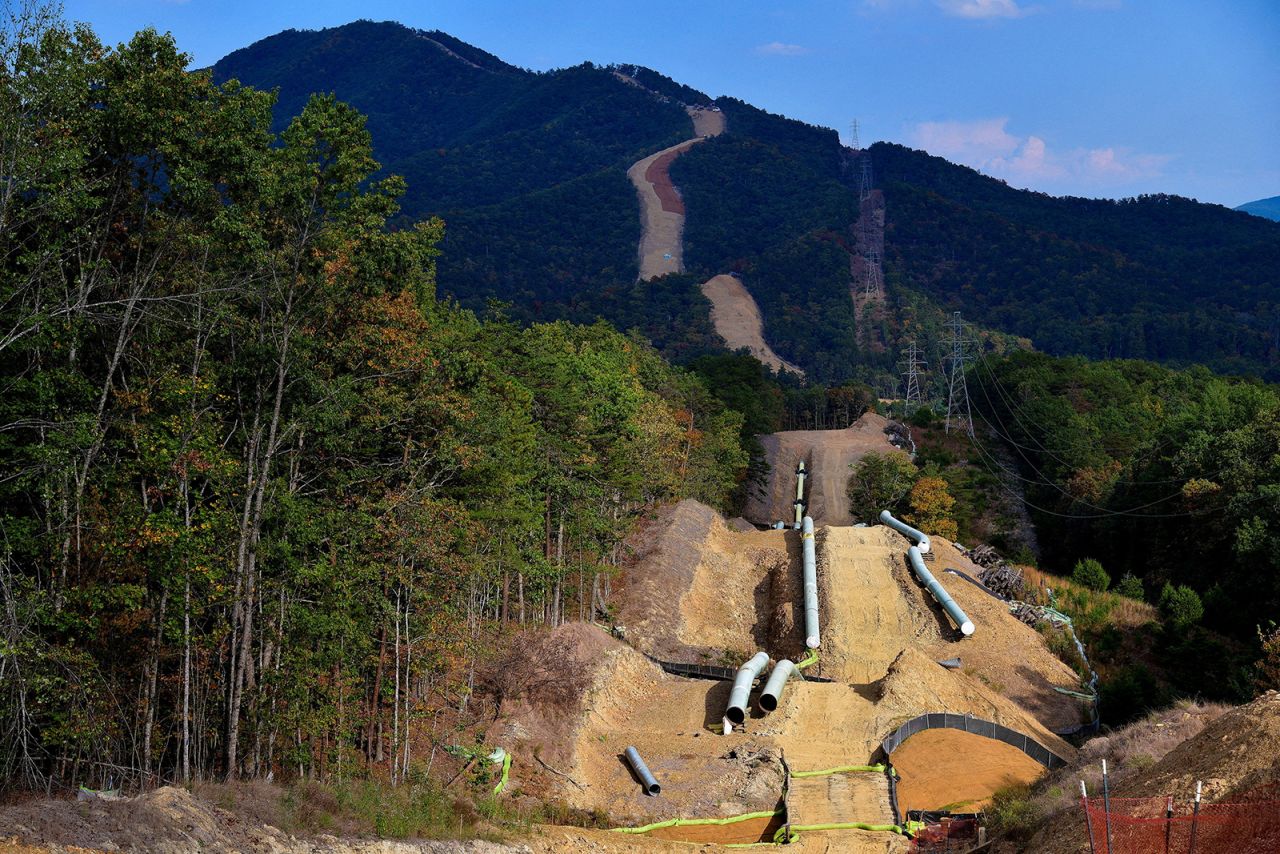 Lengths of pipe wait to be laid in the ground along the under-construction Mountain Valley Pipeline near Elliston, Virginia, on September 29, 2019. 