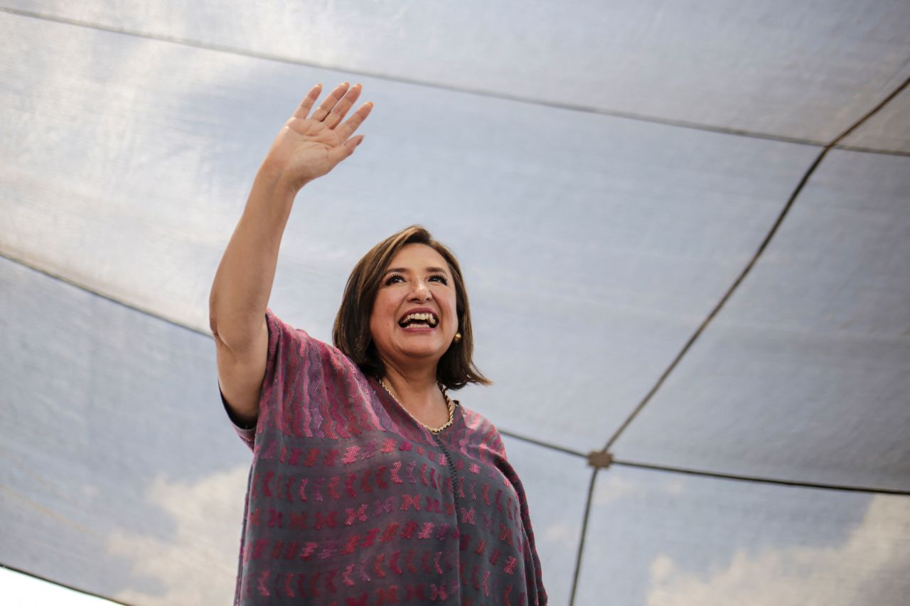 Presidential candidate Xóchitl Gálvez waves to supporters during an election campaign rally in Tarimbaro, Michoacan state, Mexico, on April 21. 