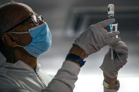 A doctor prepares a Covid-19 vaccine dose at a clinic in Norwalk, California, on May 8. 