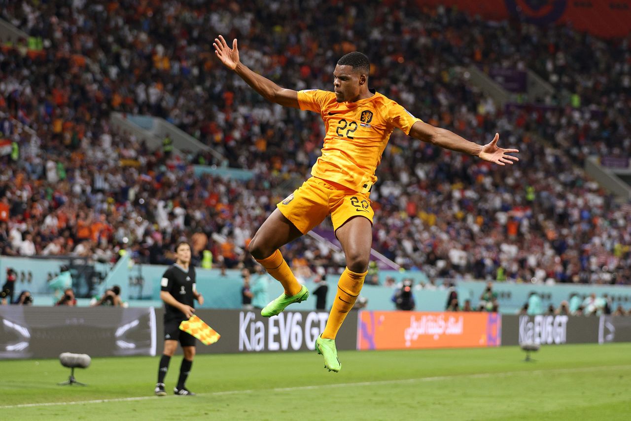 Netherlands’ Denzel Dumfries celebrates after scoring his team's third goal against the US on Saturday. 
