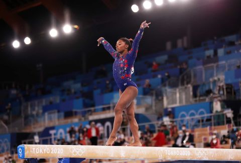 Simone Biles is pictured competing on balance beam on July 25.