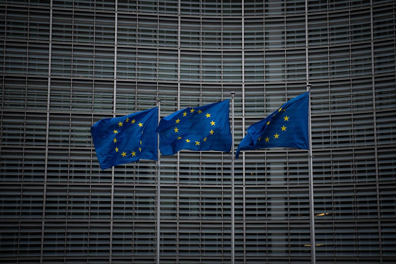 European Union flags are seen outside the European Commission on March 2, in Brussels, Belgium.