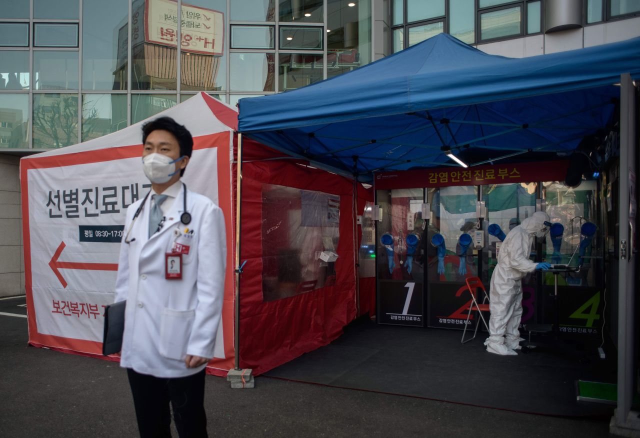 Hospital president Kim Sang-il stands outside a coronavirus testing booth at Yangji hospital in Seoul on March 17.