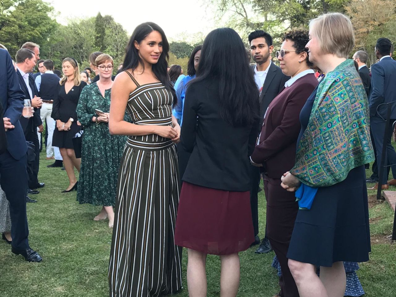 Meghan, Duchess of Sussex, chats with attendees during a reception celebrating young people in Cape Town, South Africa on Tuesday evening. 