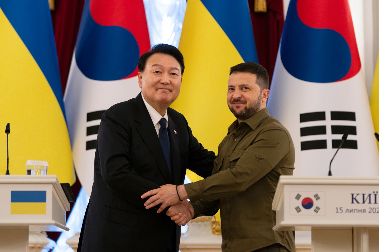 South Korean President Yoon Suk Yeol shakes hands with Ukrainian President Volodymyr Zelensky in Kyiv, Ukraine, on July 15. 