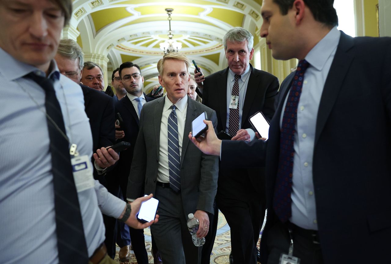 Sen. James Lankford talks to reporters as he makes his way to a meeting at the US Capitol on February 5, 2024 in Washington, DC.