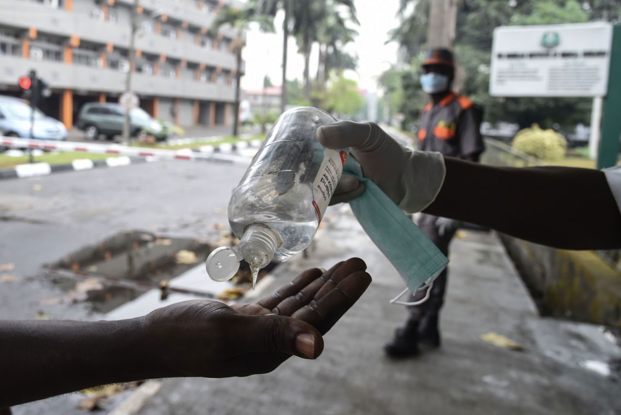 A person has their hands sanitized before entering a state hospital in Lagos, Nigeria, on February 28.