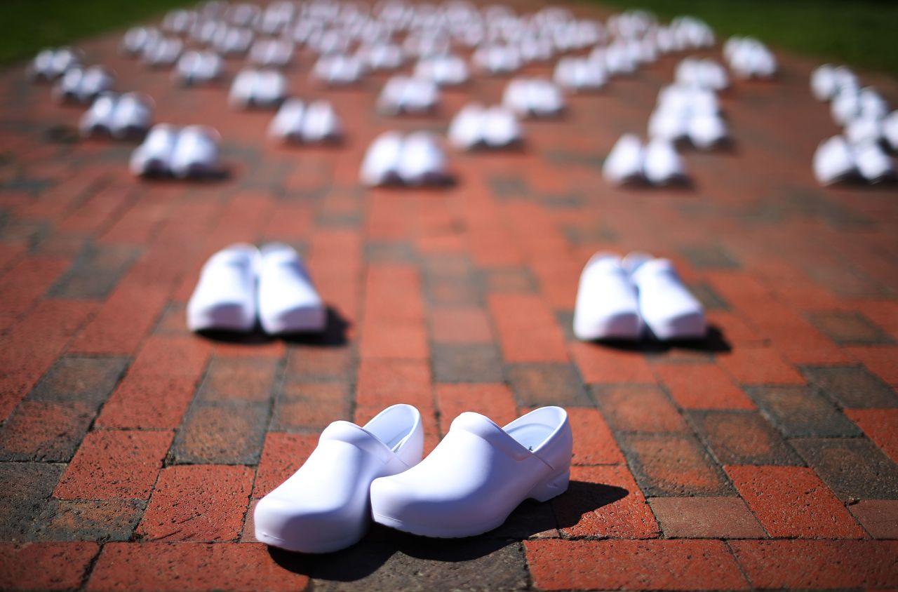 The National Nurses United set out 88 empty pairs of shoes on May 7 in Washington representing nurses that they say have died from COVID-19.