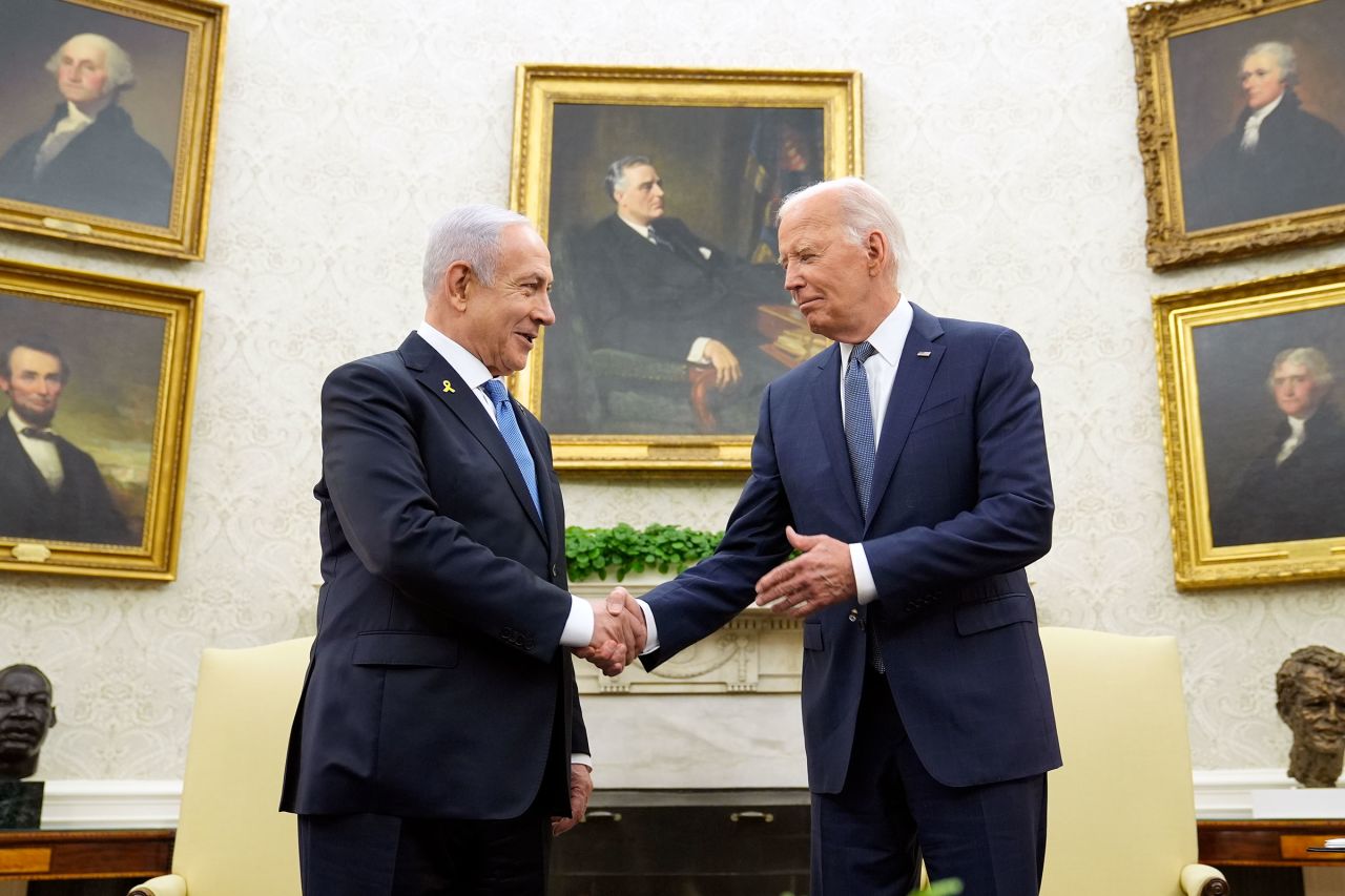 President Joe Biden, right, shakes hands with Israeli Prime Minister Benjamin Netanyahu, left, in the Oval Office of the White House in Washington, DC on Thursday. 