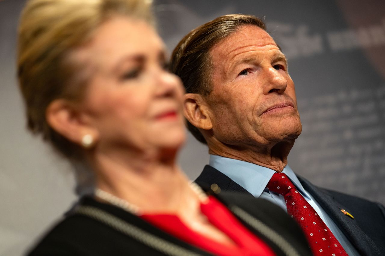 Sen. Richard Blumenthal listen as Majority Leader Chuck Schumer speaks during a news conference at the Capitol on July 30 in Washington, DC.