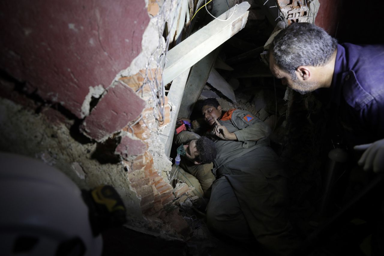 Lebanese soldiers search for survivors after a massive explosion in Beirut, Lebanon, on Wednesday, August 5. 