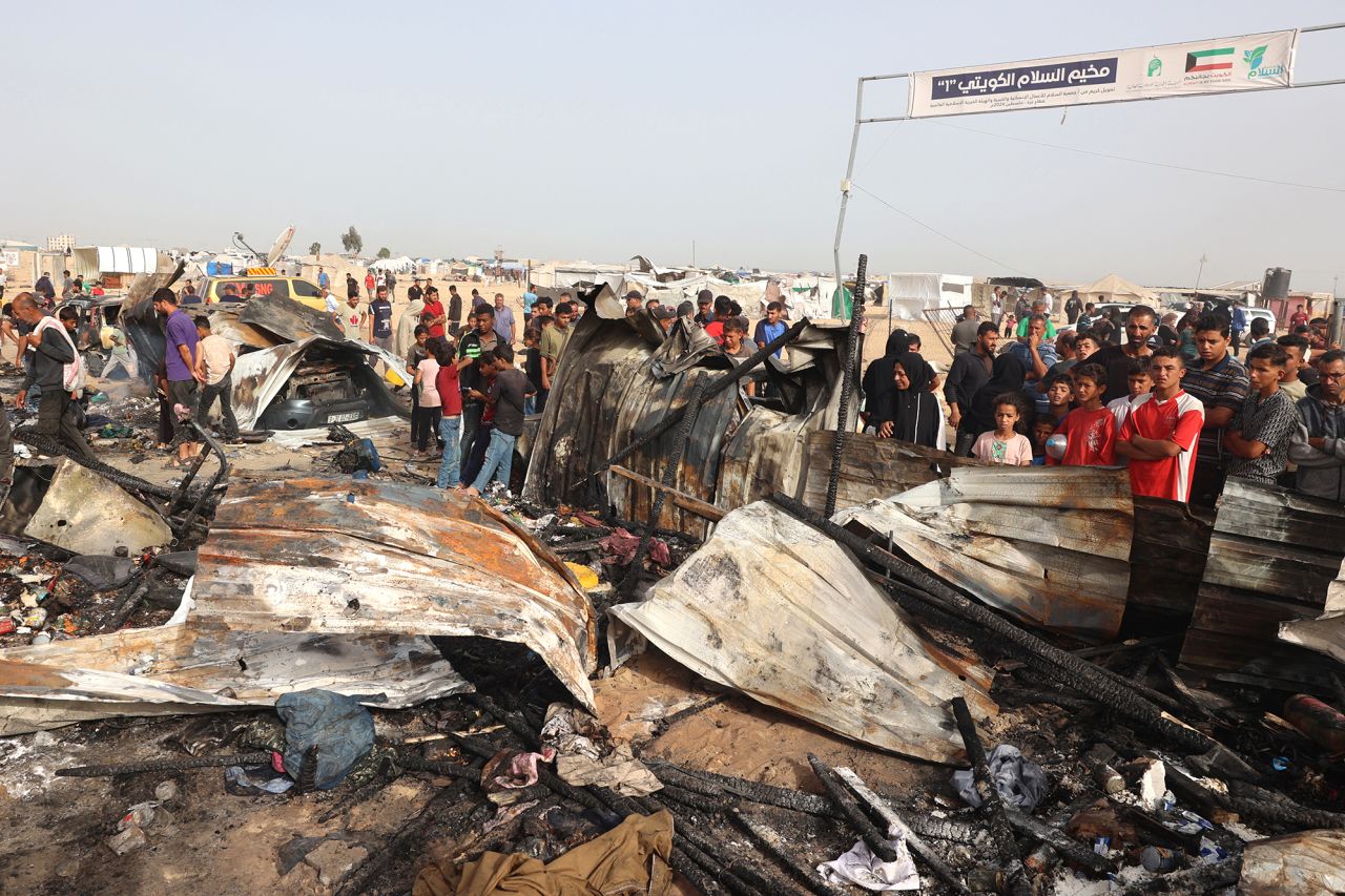 Palestinians gather at the site of an Israeli strike on a camp for internally displaced people in Rafah, Gaza, on May 27.