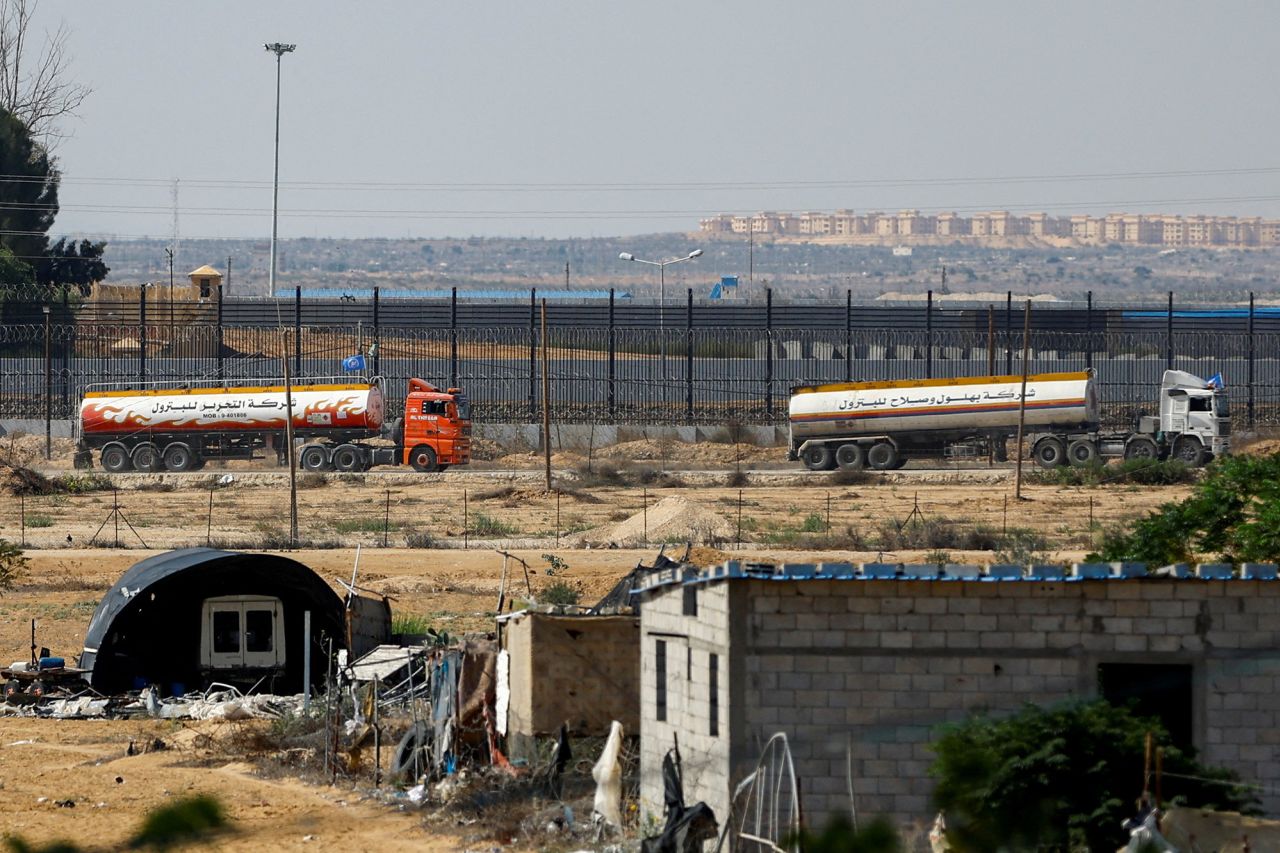 UN-flagged fuel trucks move towards the border crossing in?Rafah?in the southern Gaza Strip, on October 16.