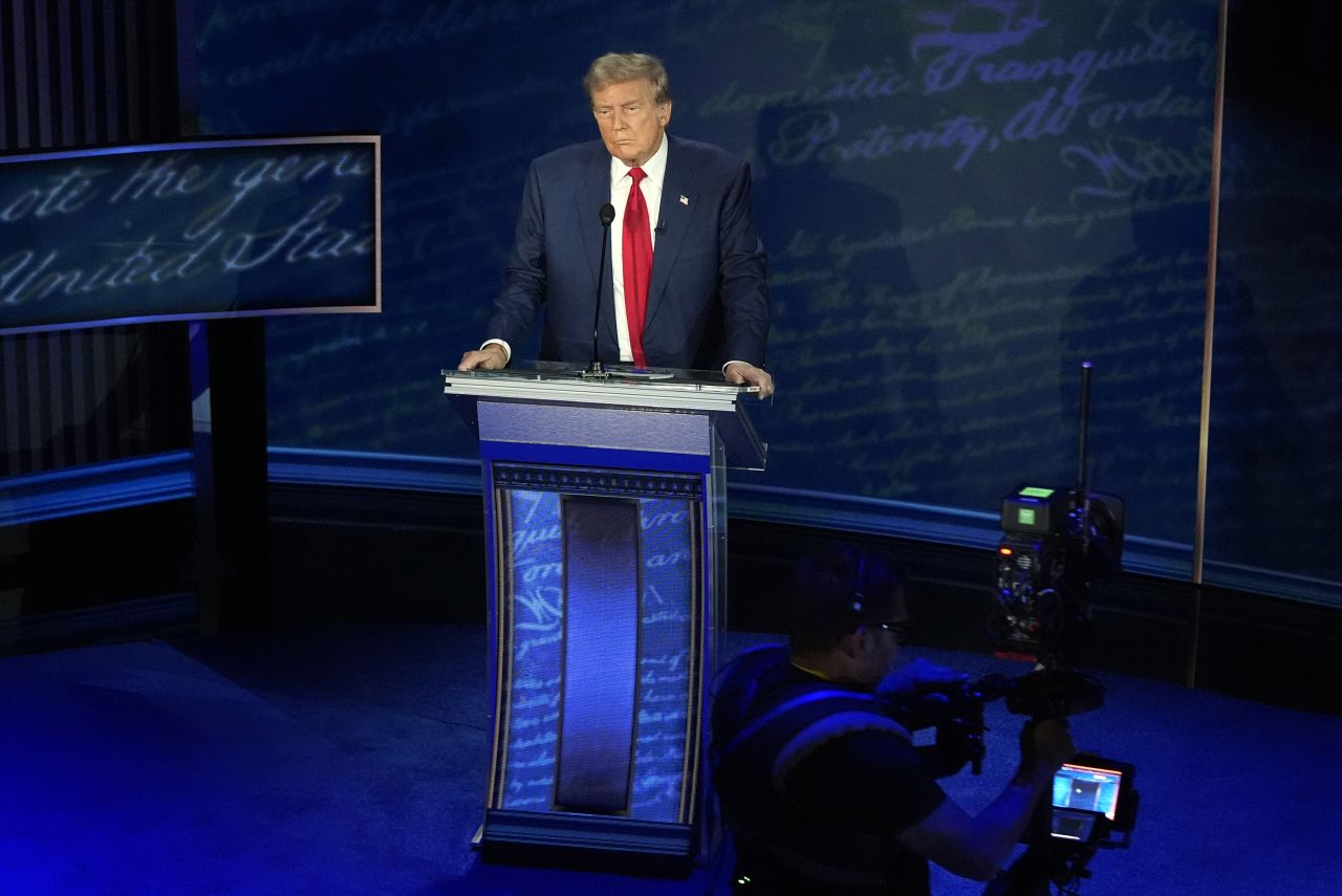 Former President Donald Trump waits during a break in the presidential debate with Vice President Kamala Harris in Philadelphia on September 10.