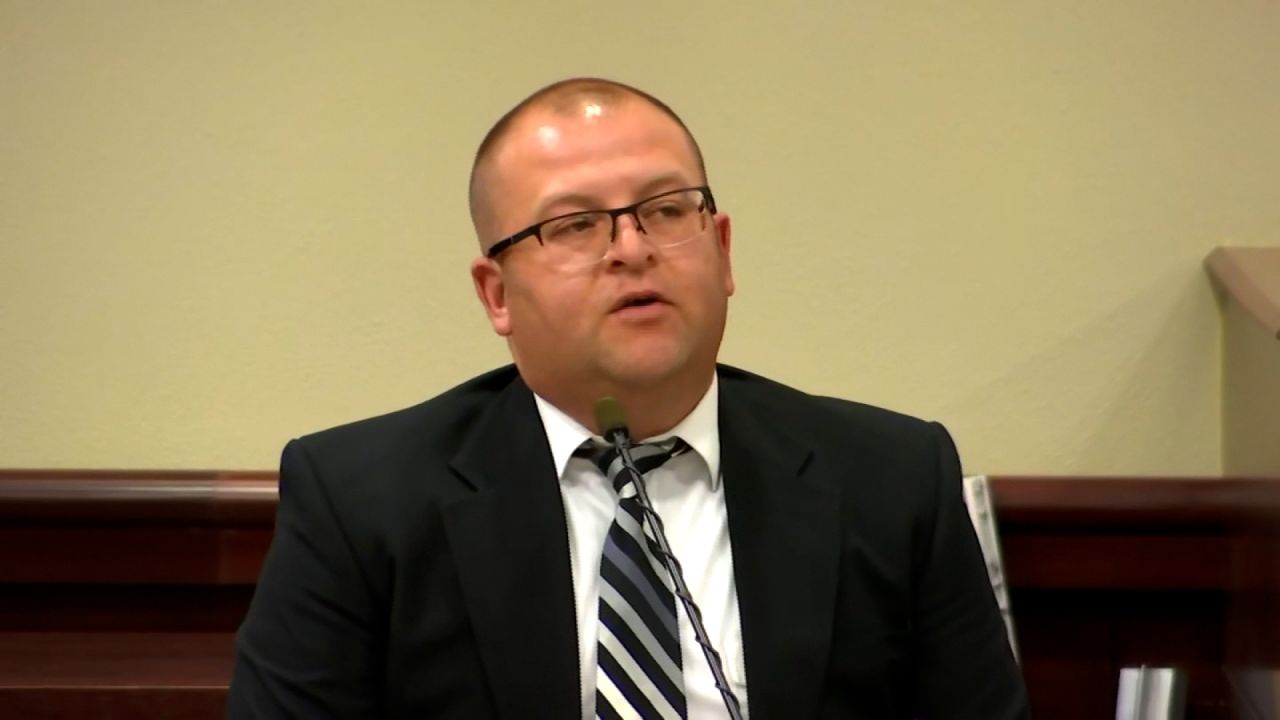 Joseph Lujan, detective at Santa Fe Sheriff’s Department, speaks on the stand in court on Wednesday.