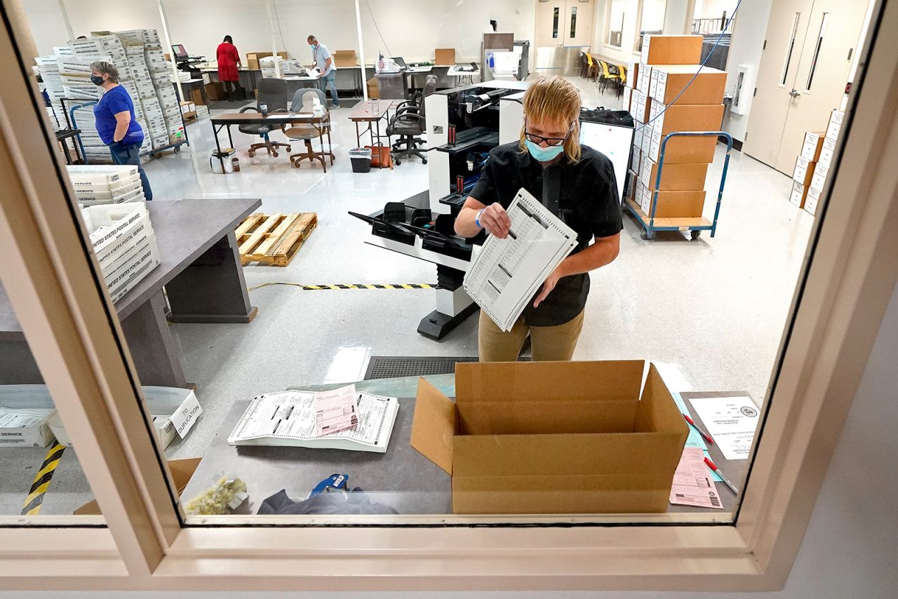 A view from outside the Maricopa County Recorder's Office where elections officials continue to count ballots for the general election, Friday, Nov. 6, in Phoenix. 