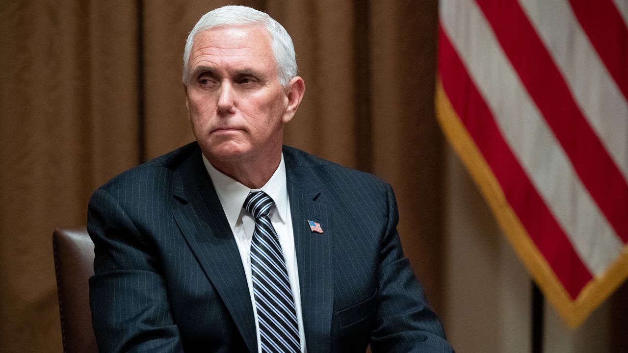 US Vice President Mike Pence attends a roundtable meeting on seniors with US President Donald Trump in the Cabinet Room at the White House in Washington, DC on June 15.