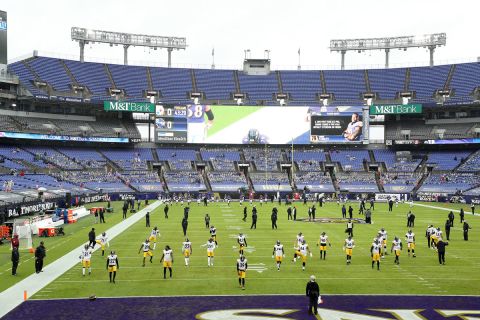 Members of the Pittsburgh Steelers warm up before the start of their game against the Baltimore Ravens at M&T Bank Stadium on November 01 in Baltimore, Maryland.