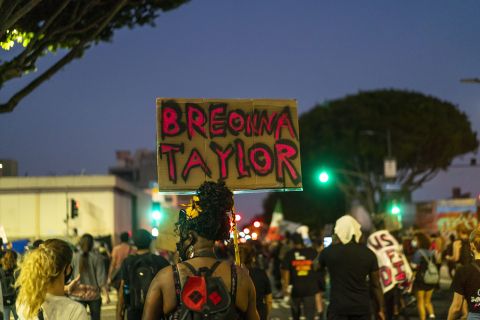 Protesters march in downtown Los Angeles during a demonstration held to demand justice for the death of Breonna Taylor after the results of a grand jury indictment of former Louisville police officer Brett Hankison in Los Angeles, California, on 23 September.