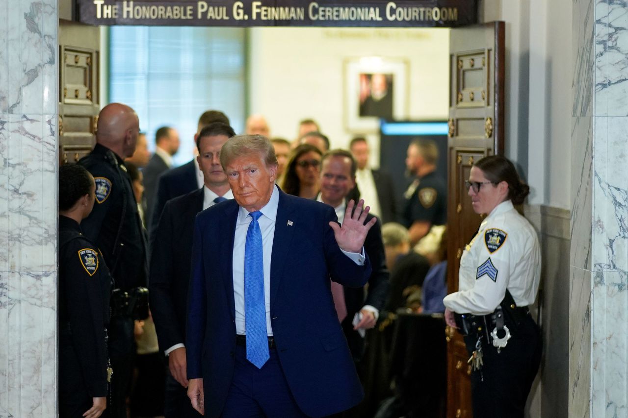 Former President Donald Trump walks out of the courtroom during a break in proceedings at New York Supreme Court on Monday.