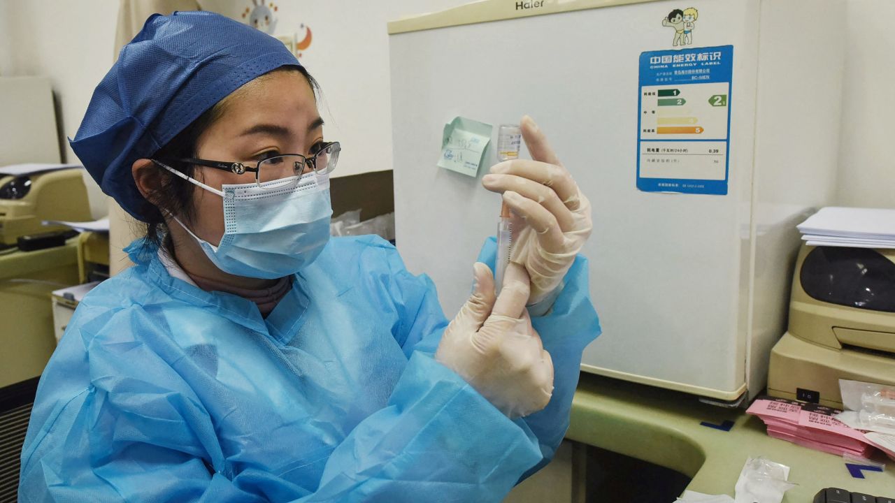 A medical worker prepares to administer a Sinovac Biotech Covid-19 vaccine in Hangzhou, China, on March 15. 